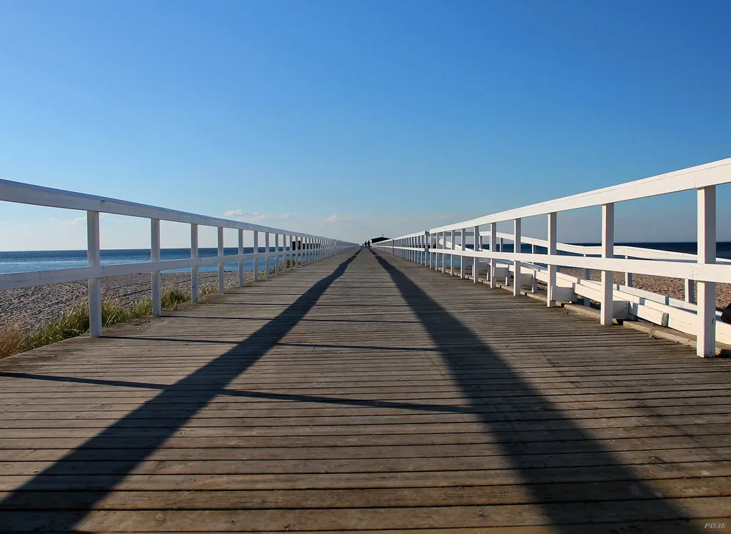 T-Bryggan, Malmö – wooden pier extending into the sea at Ribersborg beach with clear sky — salsa, bachata venue in Malmö