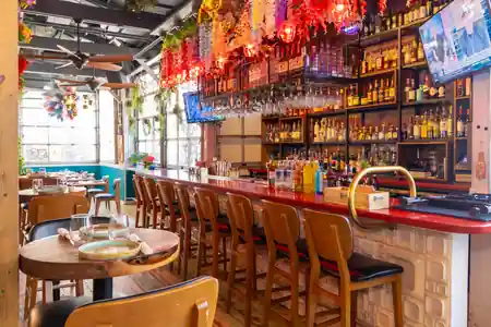 Colorful bar interior at Sebastián Pintxos Bar Atlanta — salsa, bachata venue in Atlanta