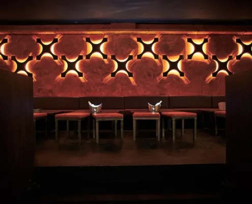DANZON Latin Club lounge seating area in Vienna with decorative wall lighting