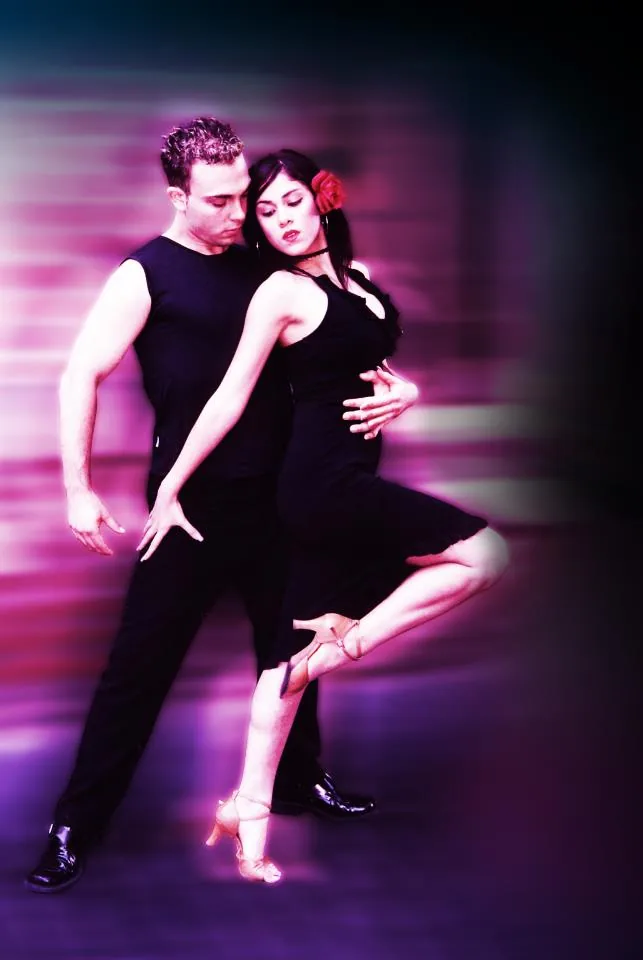 Glamour latin dance couple in close hold at Danza Pasion dance studio Perth