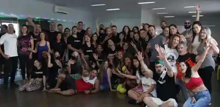 Dance community group photo at Muvon Dance studio, Brasilia — salsa, bachata venue in Brasília