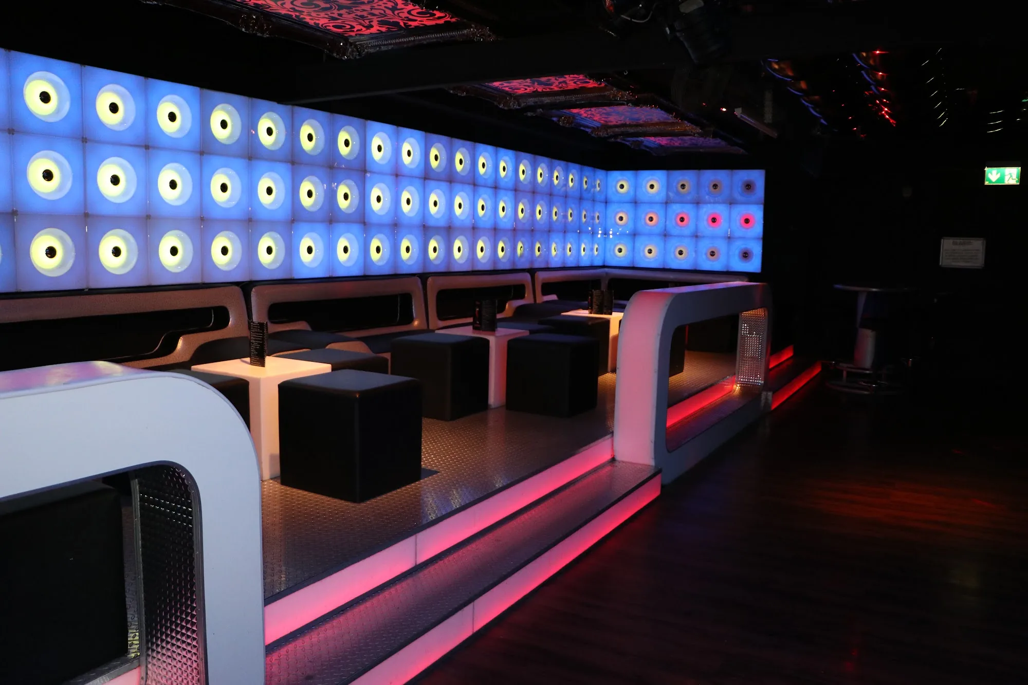 VIP lounge with glowing LED tile wall at Sabor Latino nightclub in Winterthur Switzerland