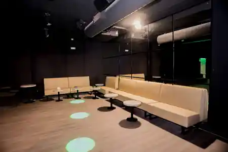 Empty modern club interior with stage lighting at Antilla Salsa, Barcelona