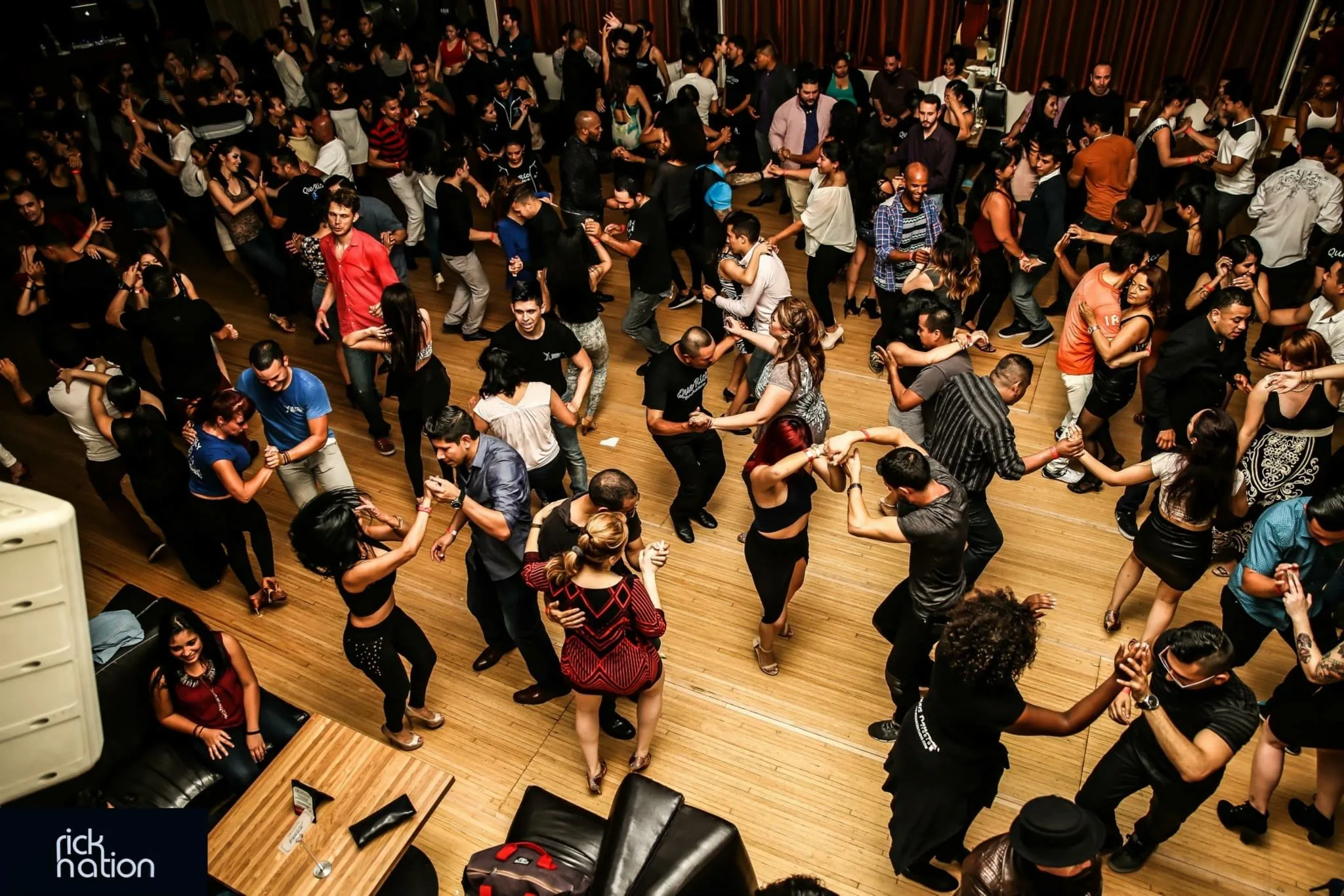 Crowded social dance floor with couples dancing on the wooden floor at The Granada LA, Los Angeles