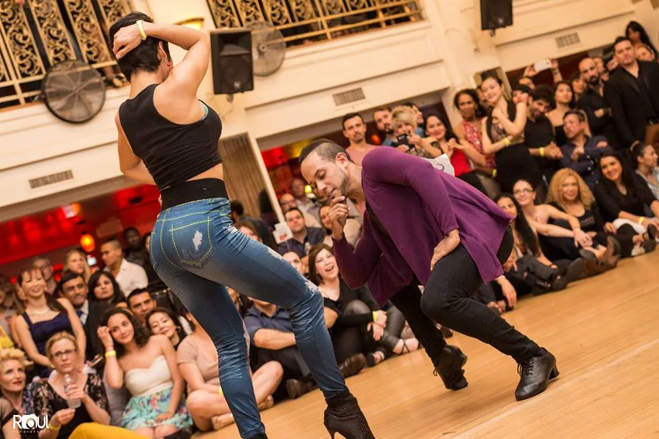 Dance performance couple in front of a seated audience in the main hall at The Granada LA, Los Angeles