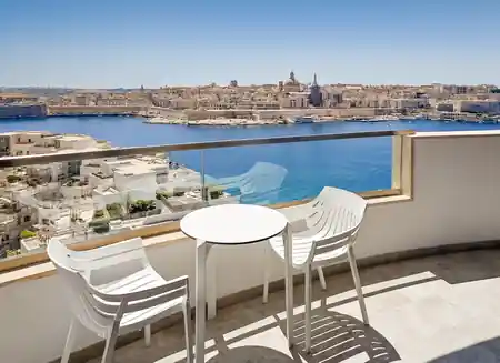 Balcony with sea view and Valletta panorama at Barceló Fortina Malta hotel — salsa, bachata venue in Sliema