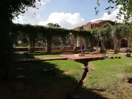 Garden grounds and exterior of Ruinas de San Francisco historic venue Santo Domingo — bachata, salsa venue in Santo Domingo