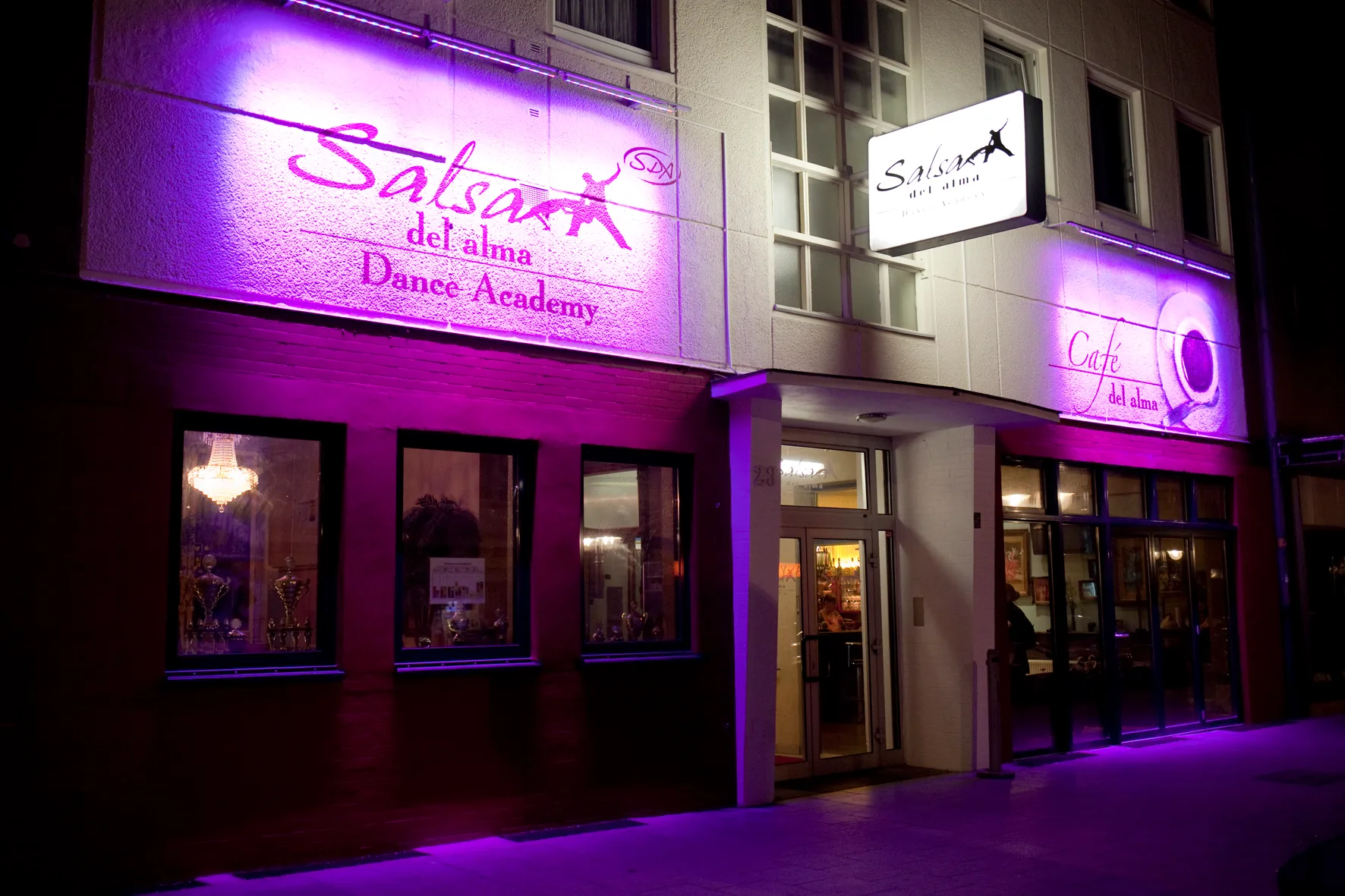 Salsa del Alma Dance Academy exterior at night with illuminated signage in Hannover