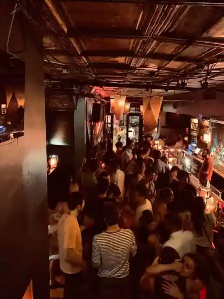 Elevated view of a crowded Latin dance night at Solas Bar in New York, with dancers filling the atmospheric underground venue — salsa, bachata, zouk venue in New York