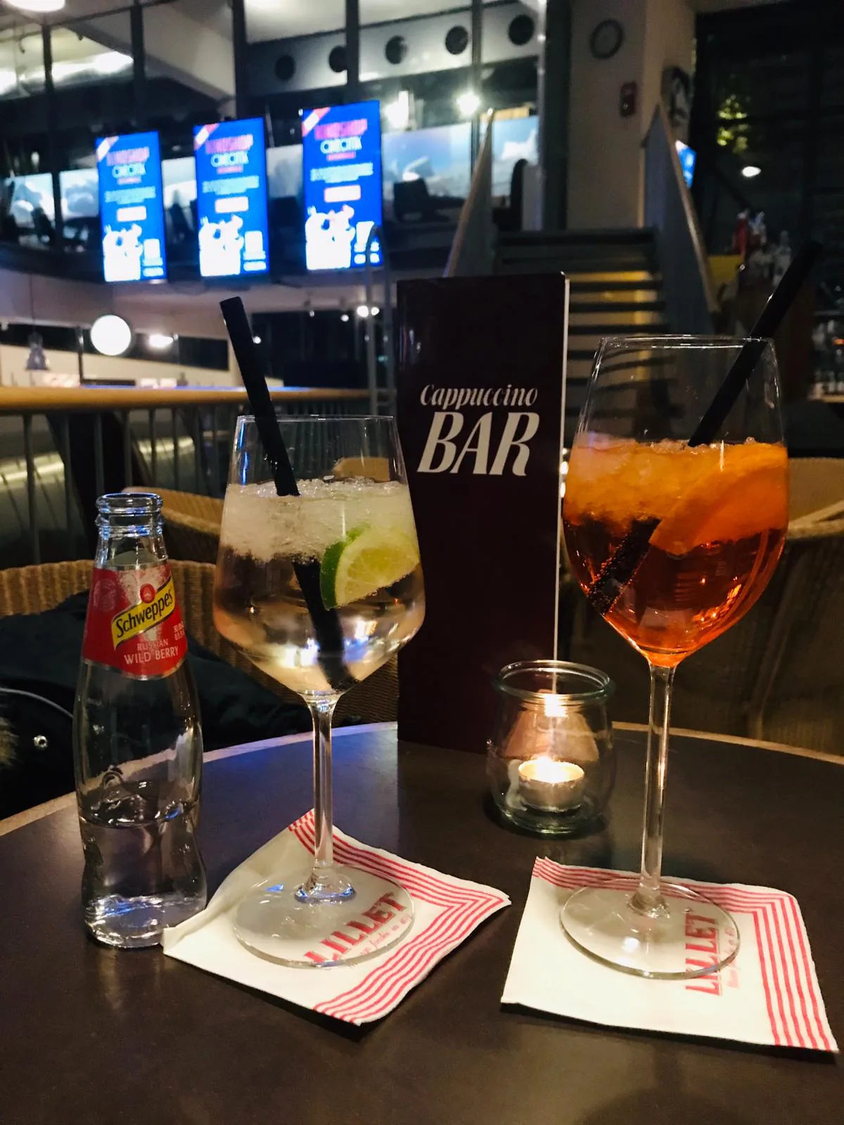 Cappuccino Bar interior at Cinecitta Nuremberg with cinema screens and cocktails