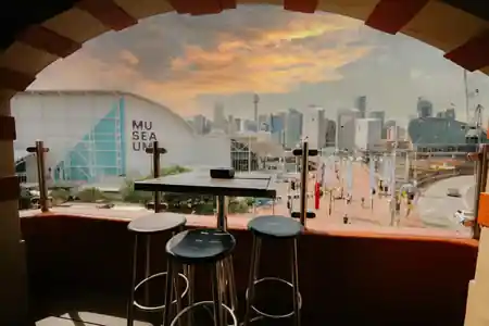 Rooftop bar at upstairs @ Pyrmont Bridge Hotel with Sydney Darling Harbour skyline view — bachata venue in Sydney