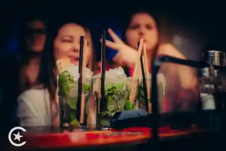 Mojito cocktails on the bar at Cuba Libre Latin Dance Club in Poznan during a Latin dance party — salsa, bachata venue in Poznan