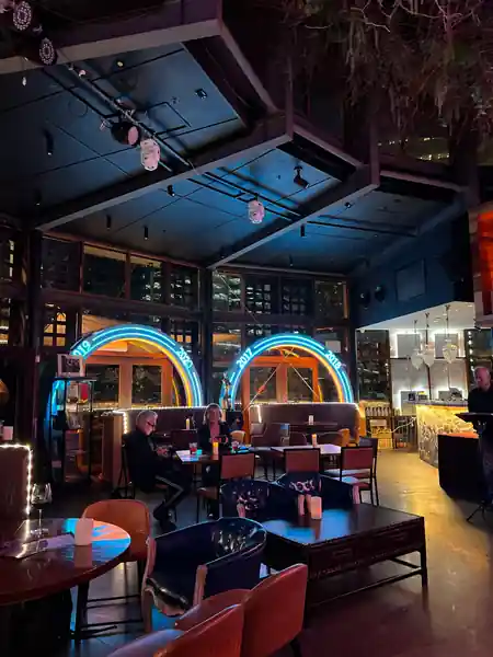 Interior lounge seating and neon-lit bar atmosphere at Rouge, Darling Harbour Sydney — bachata, salsa venue in Sydney