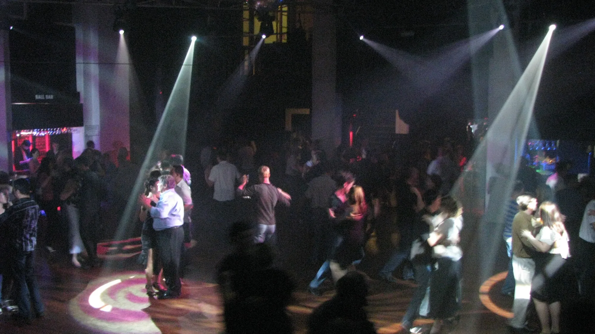 Packed social dance floor with crowd and stage lights at Gilkisons Dance Studio Perth