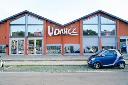 UDance School building exterior with signage in Lisbon Portugal — salsa, bachata, kizomba venue in Lisbon