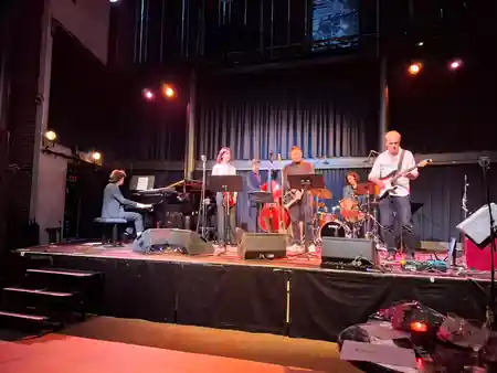 Live band performing on stage at Grounds Rotterdam venue — salsa, bachata venue in Rotterdam
