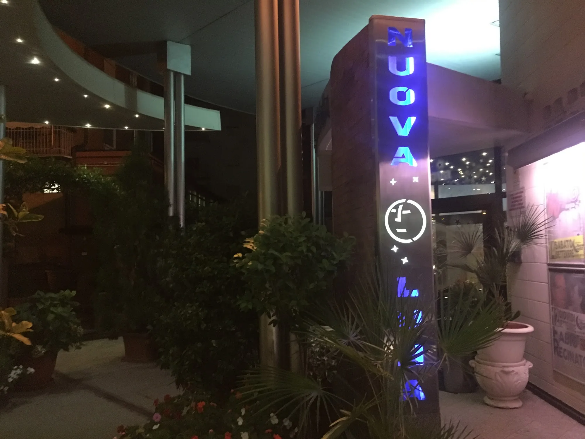 NUOVA LUNA illuminated sign at the disco entrance in Sala Bolognese Italy