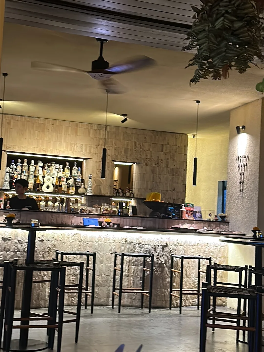 Bar interior with stools and warm lighting at Jalapeno Bali