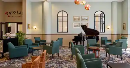 Polish Club Ashfield lounge interior with grand piano and elegant seating, Sydney — salsa, bachata venue in Sydney