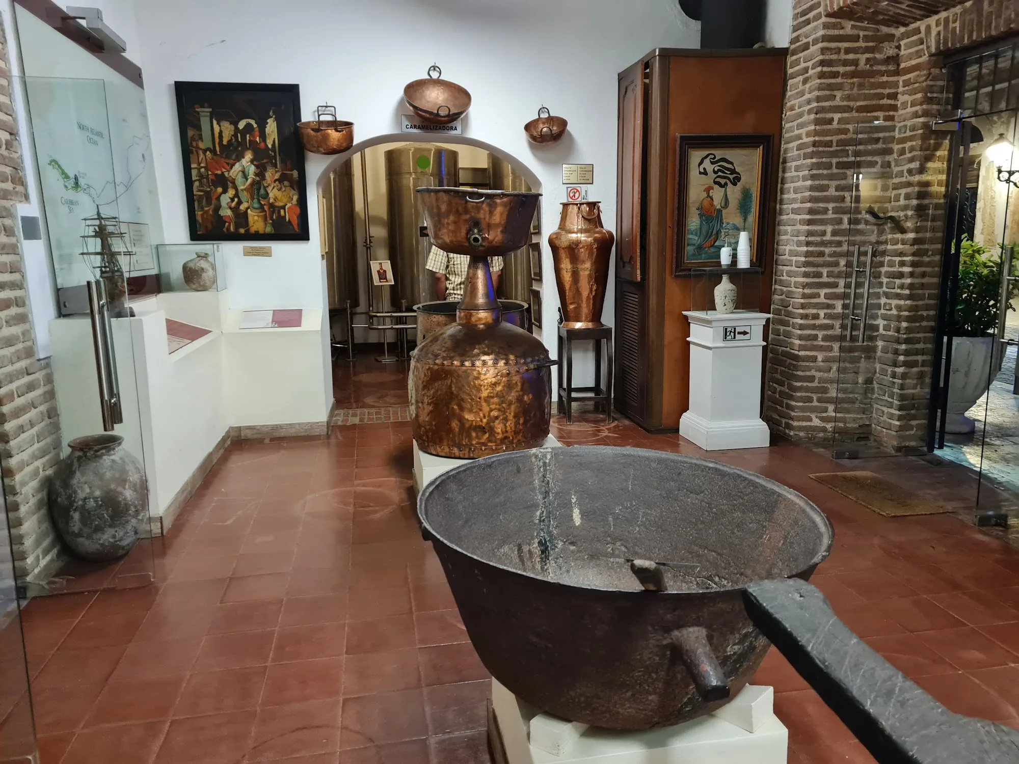 Rum distillation equipment museum display at Bar Museo del Ron Dominicano, Santo Domingo
