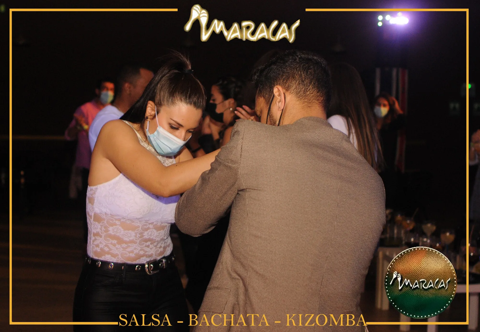 Partner dancing couple on dance floor at Sala de Baile Maracas Fuenlabrada Spain