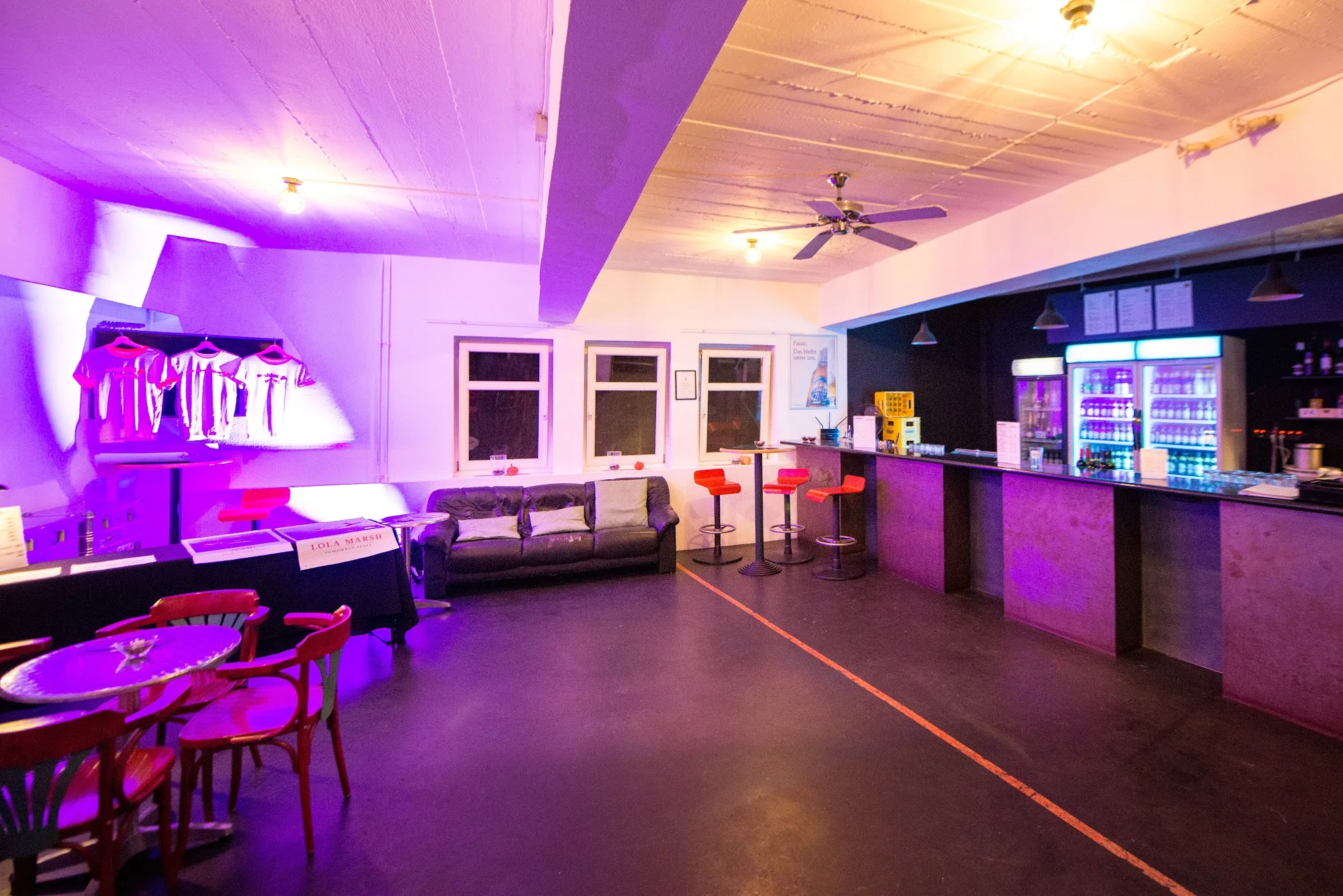 Brotfabrik Frankfurt venue interior with bar and dance floor under purple lighting