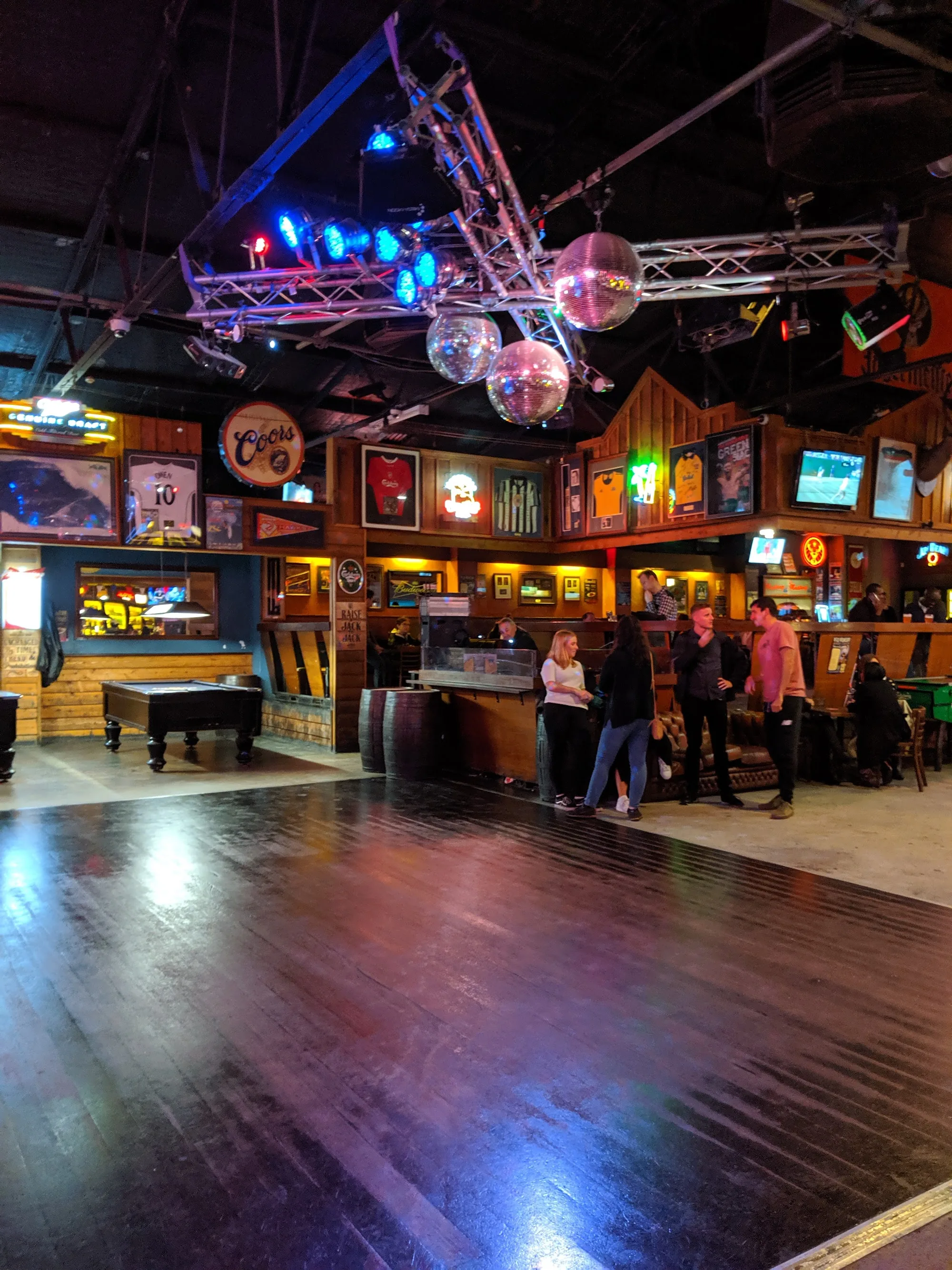 Mustang Bar Perth interior with dance floor, disco ball and bar in background