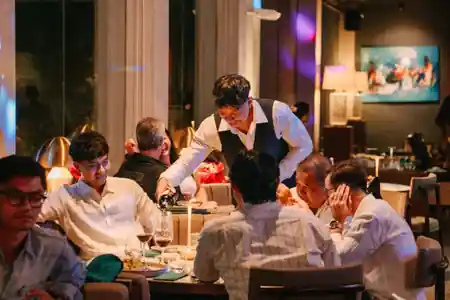 Guests dining and socialising in the evening lounge at Midaz Bali — salsa, bachata, kizomba venue in Bali