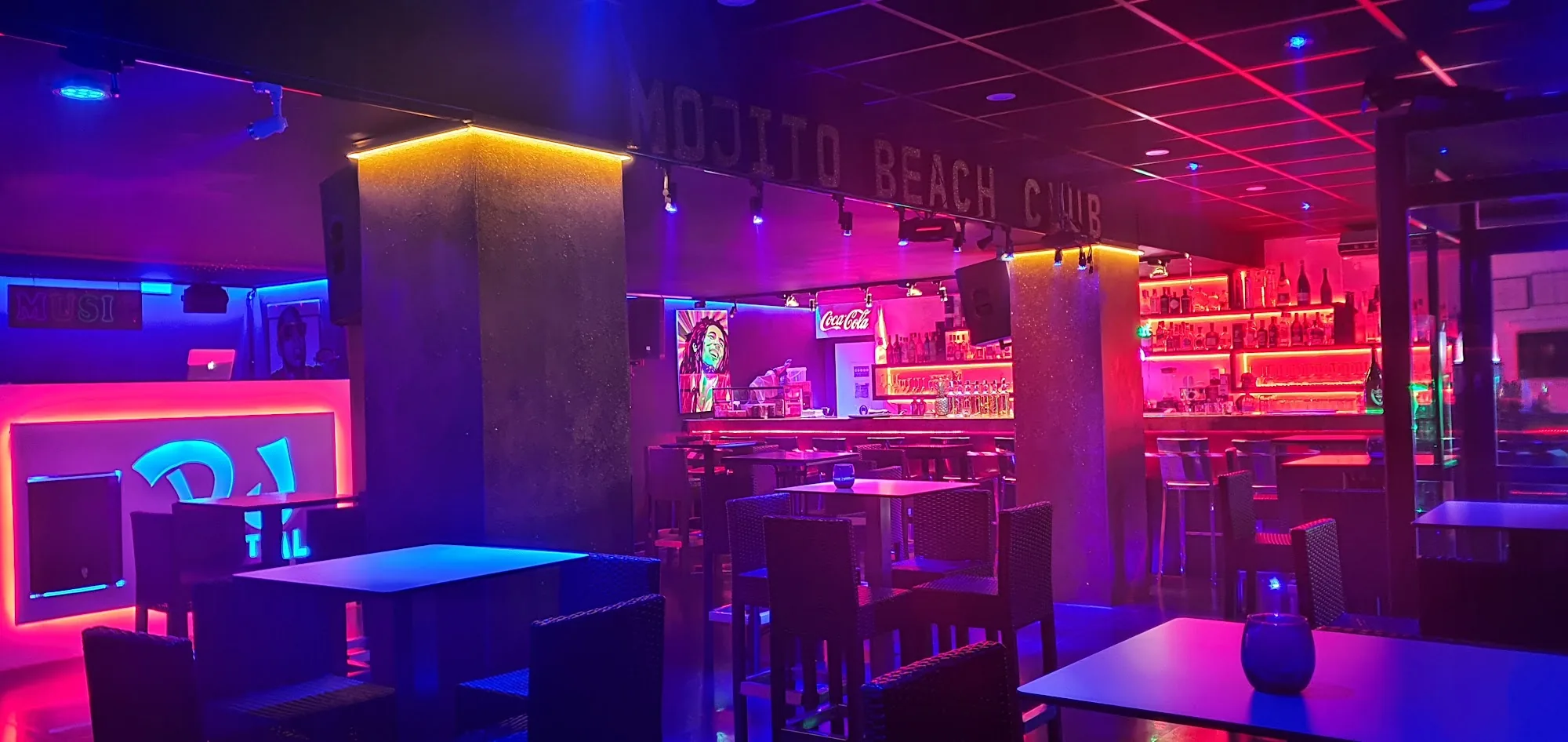 Mojito Beach Club Barcelona interior with vibrant club lighting and bar