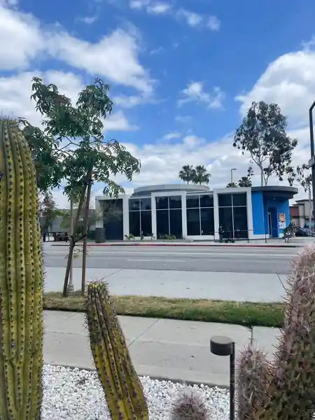 Daytime exterior of the blue-domed iVenueLA building in Los Angeles, identifiable Latin event venue — salsa, bachata venue in Los Angeles