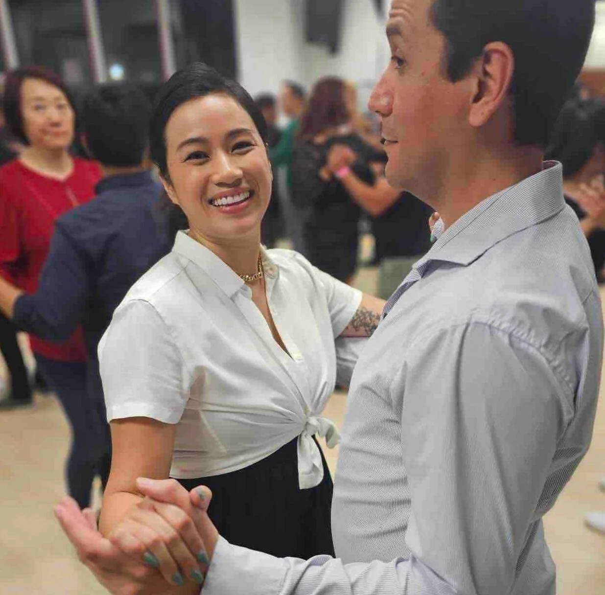 Dancers practicing during a salsa class at OC Salsa Dance Studio in Fountain Valley