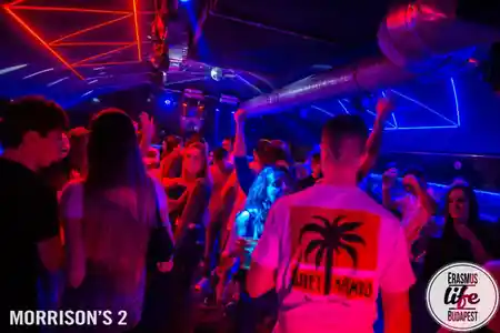 Dancers under disco lights and lasers on the Morrison's 2 Klub dance floor in Budapest — bachata venue in Budapest