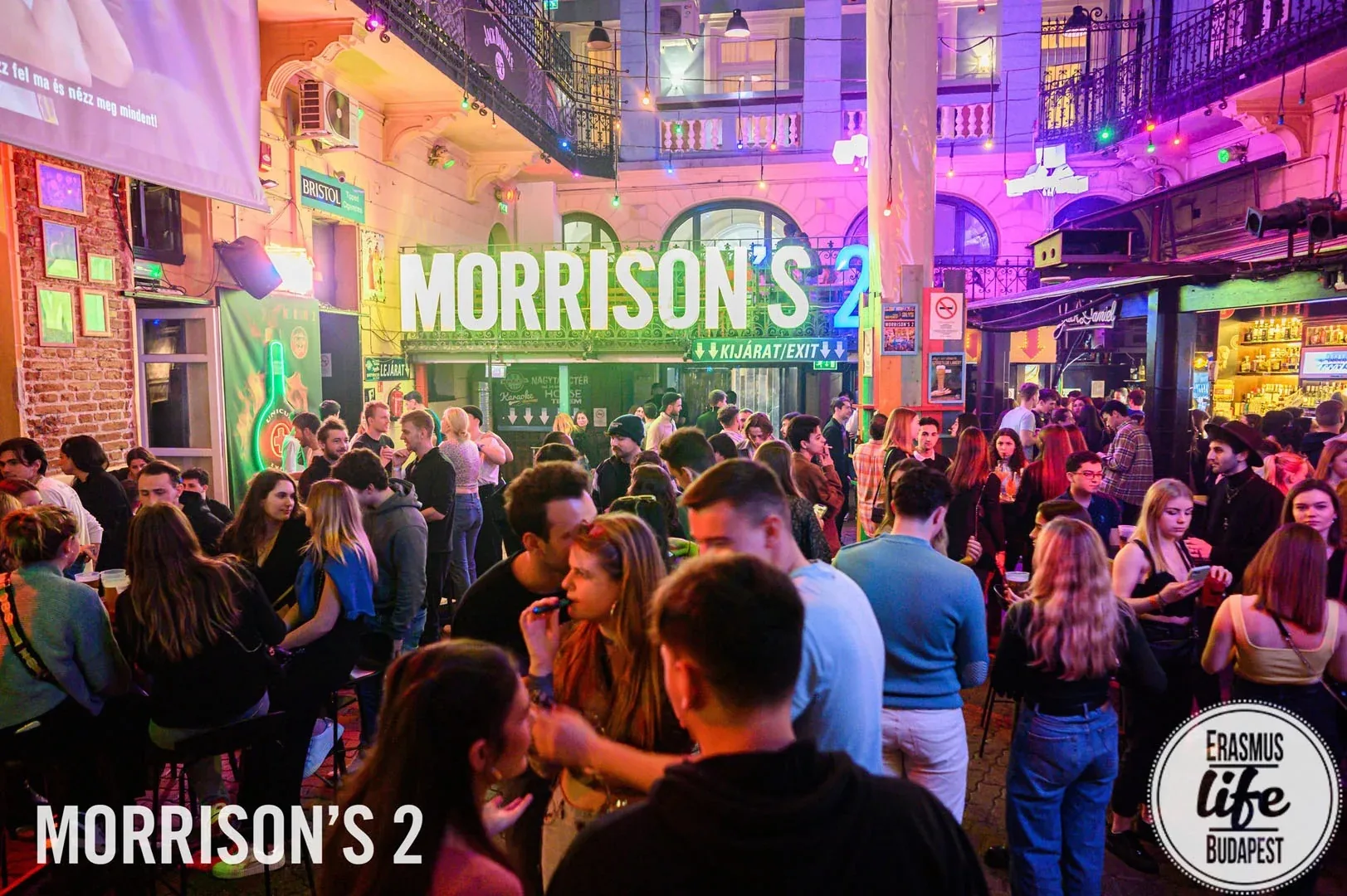 Crowd mingling in the courtyard bar at Morrison's 2 Klub in central Budapest