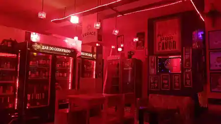 Bar interior with red LED lighting and Bar do Godofredo branding in Brasília — bachata, kizomba, salsa, zouk venue in Brasília