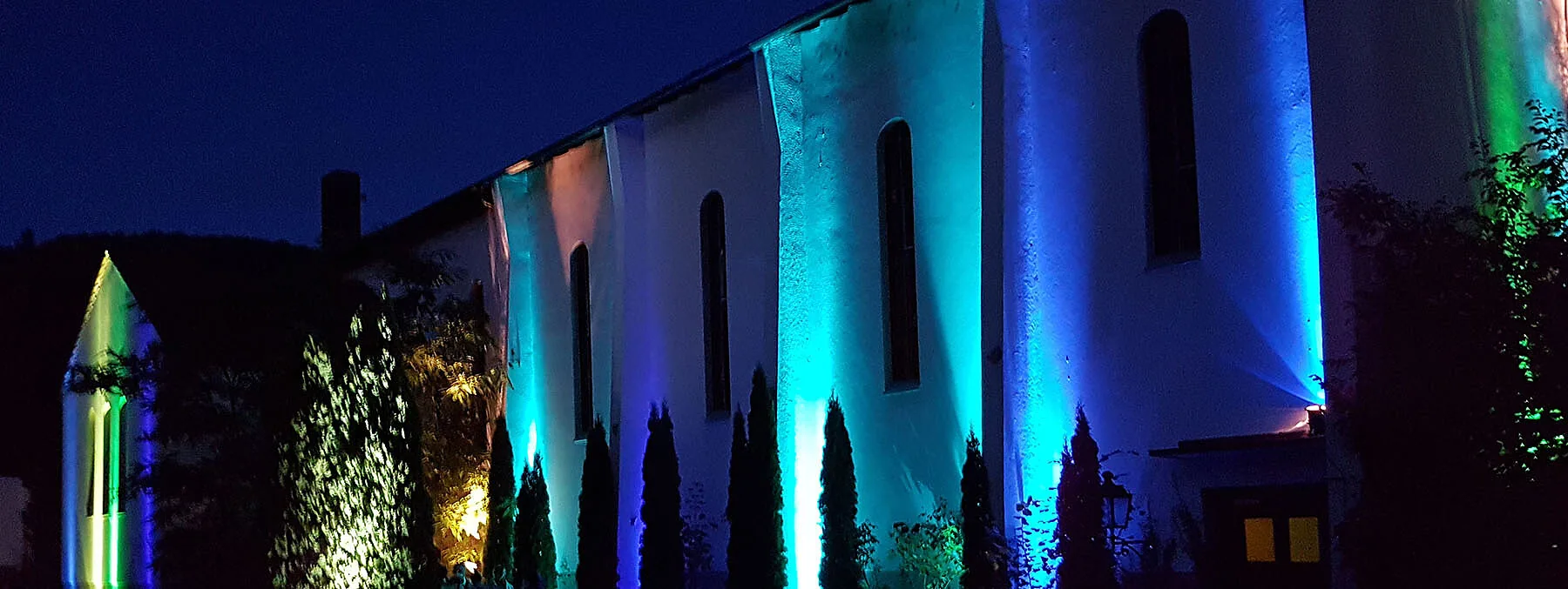 Chapel Heidelberg exterior at night, illuminated cultural center — bachata, salsa, kizomba venue in Heidelberg