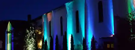 Chapel Heidelberg exterior at night, illuminated cultural center — bachata, salsa, kizomba venue in Heidelberg