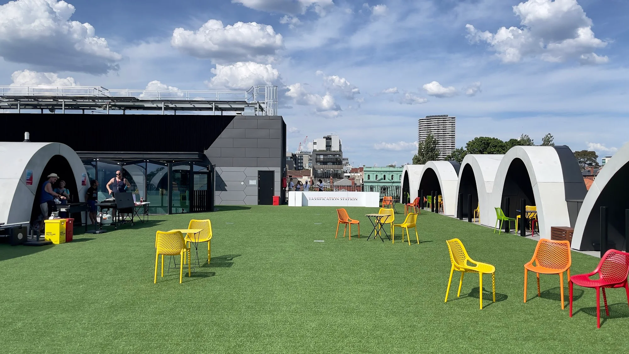 Outdoor event space with colored chairs at Victorian Pride Centre Melbourne