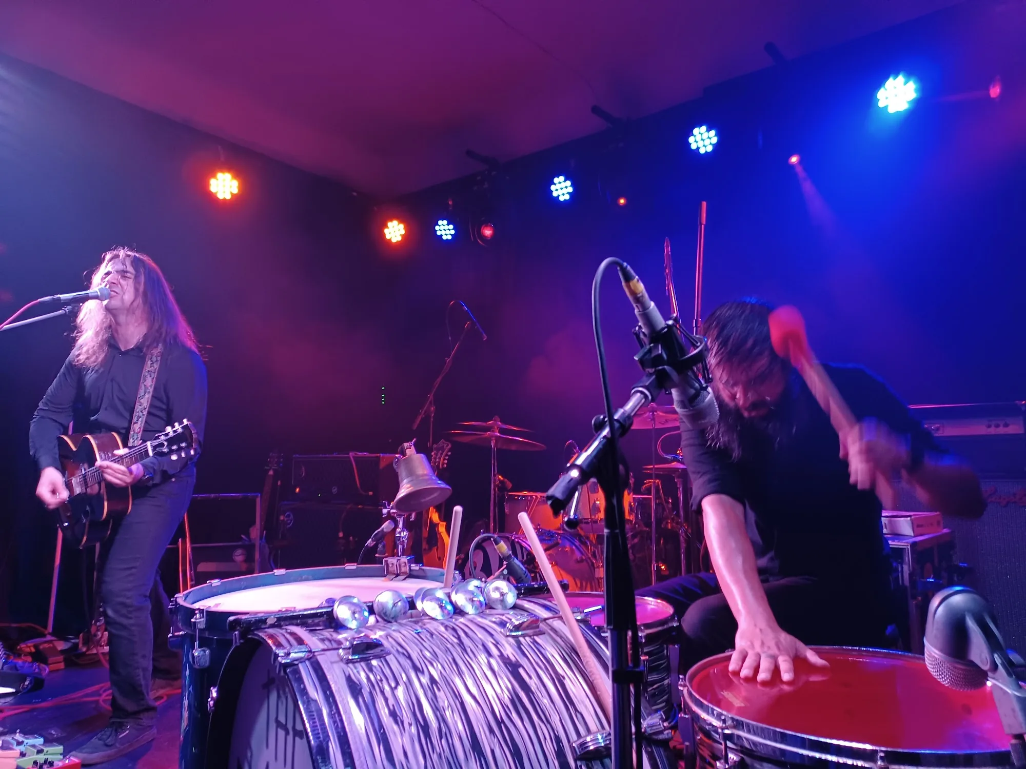 Live band performing under colourful stage lights at Downstairs At The Dome in London