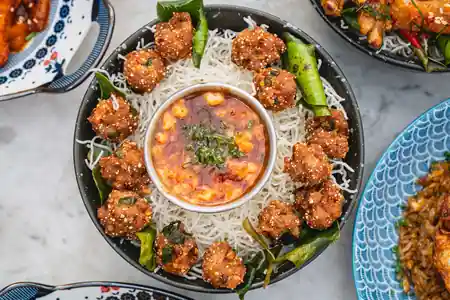 Assembly Point Thonglor, Bangkok – indoor seating area with warm ambiance — salsa, bachata, kizomba venue in Bangkok