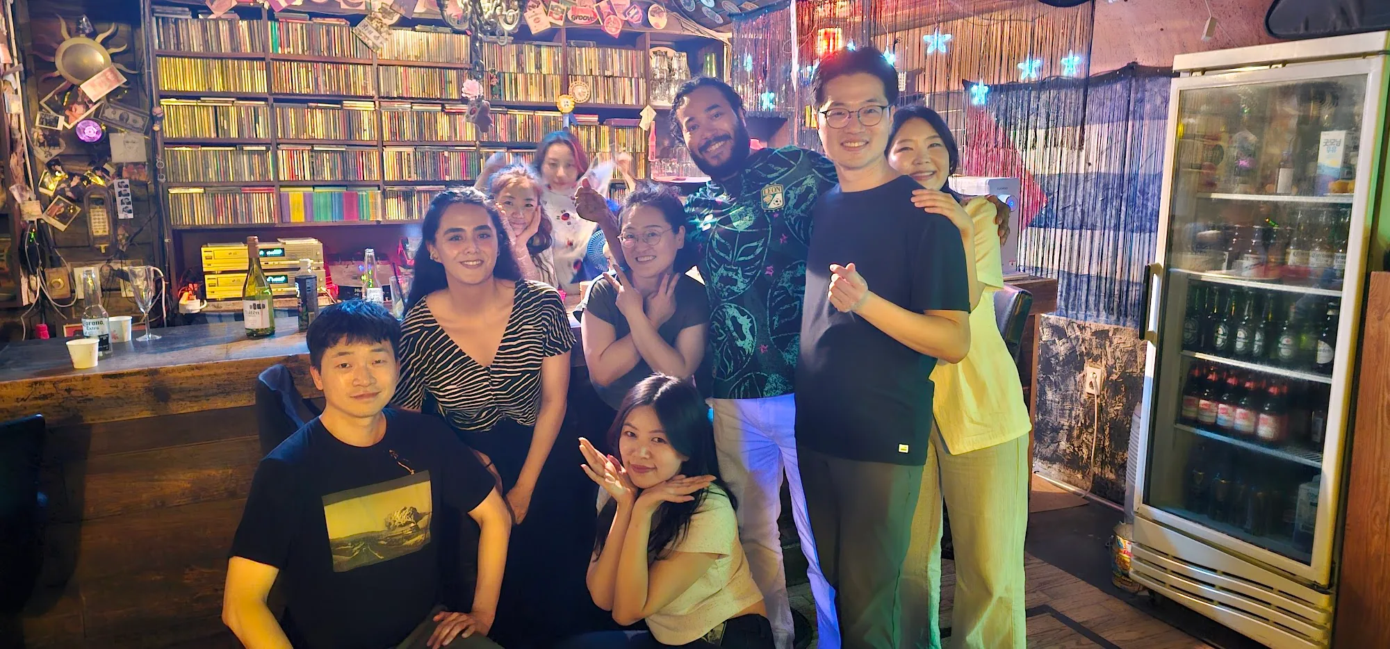 Group of friends gathering at Club Havana Seoul salsa bar interior