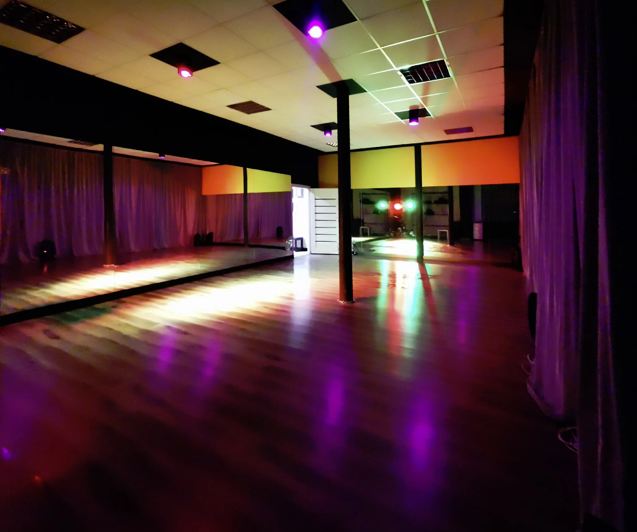 TONdance dance hall with party lighting and polished dance floor ready for social dancing in Lodz