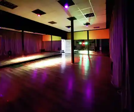 TONdance dance hall with party lighting and polished dance floor ready for social dancing in Lodz — bachata, salsa, kizomba, zouk venue in Lodz