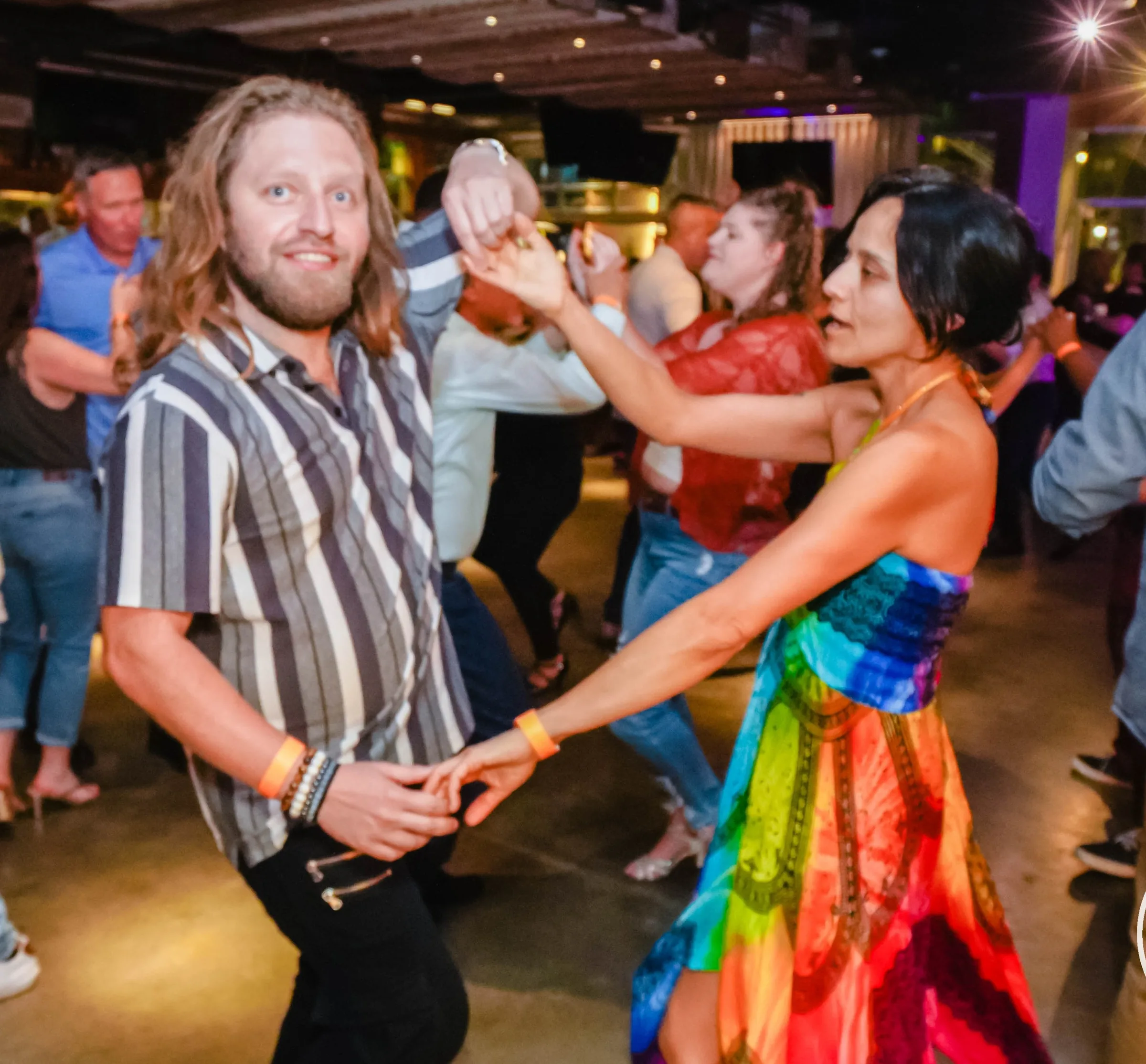Salsa social dancing crowd at Mariscos El Pacifico dance night in Vista