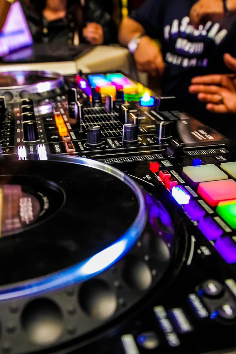 DJ booth with mixer and turntables at Le Le Bahia Latin club in Milan — salsa, bachata, mix, reggaeton, merengue venue in Milan